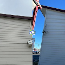 Alpenas-1-Commercial-Soft-Wash-Service-Building-Wash-Performed-for-Verizon-US-23-South-Alpena-MI 3